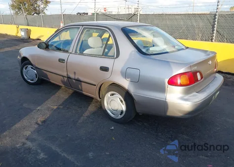 1999 Toyota Corolla Ce из США, поврежденный, VIN 1NXBR12EXXZ230172